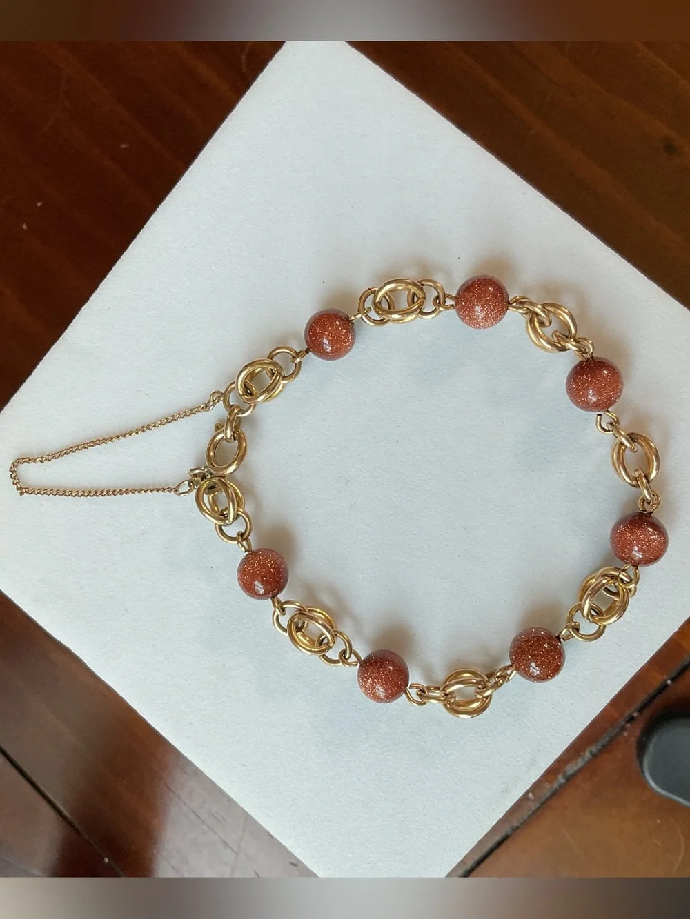 Goldstone and Gold Tone Chain Link Bracelet with Safety Chain Orange